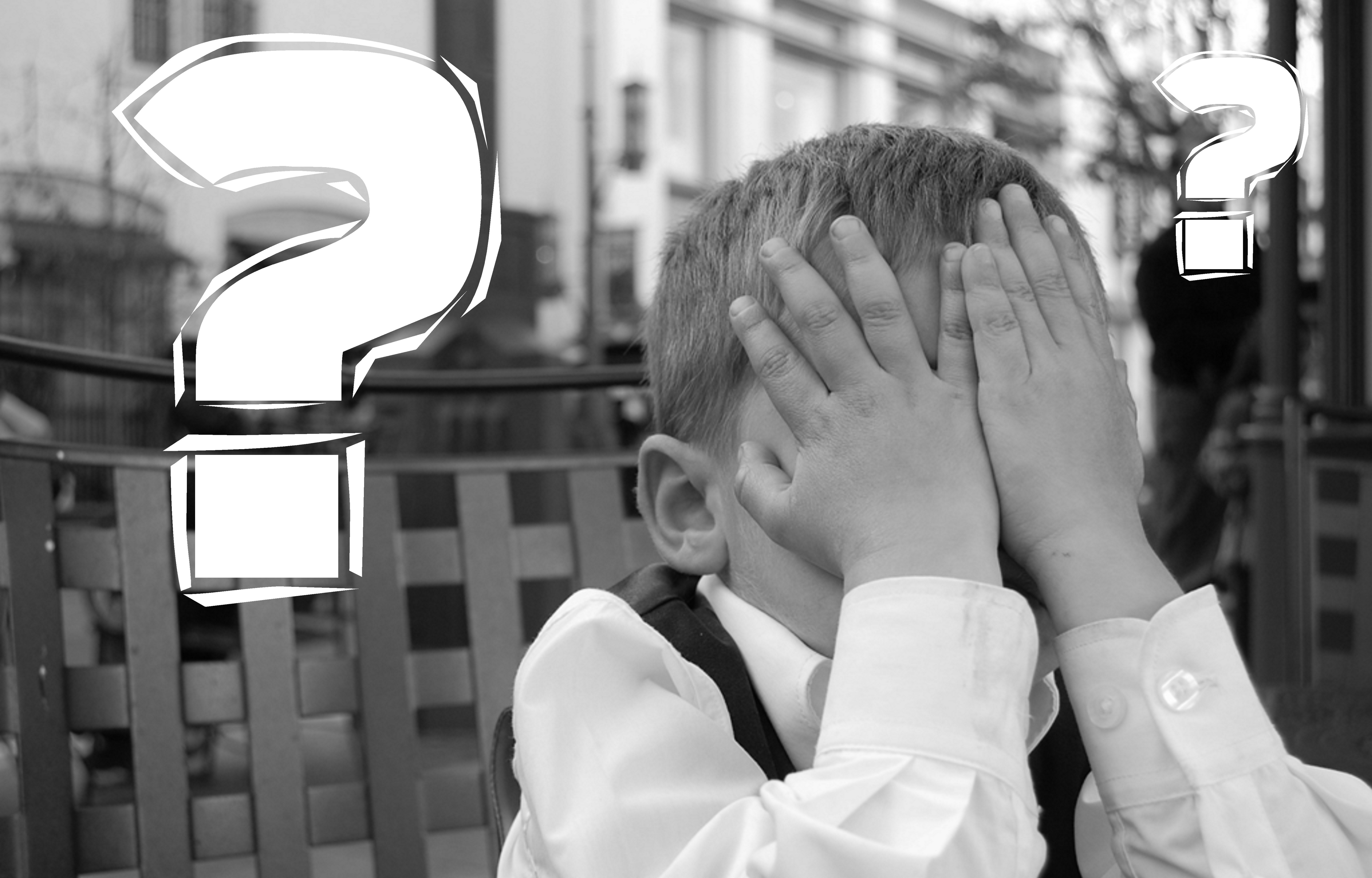 Canva – Kid Covering his Eyes Next to a Question Mark